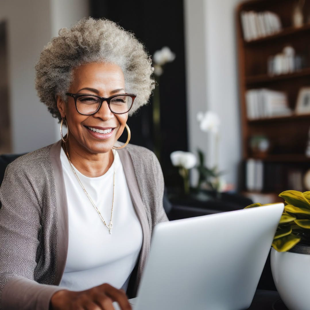 Senior citizen using computer