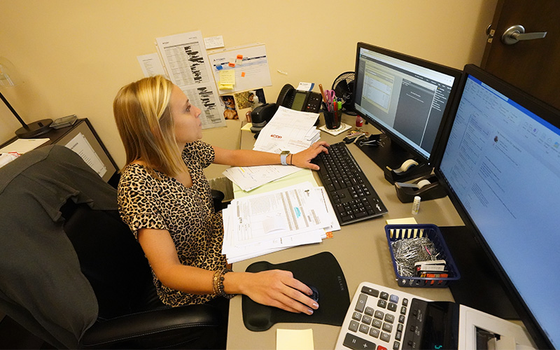 female student in office setting